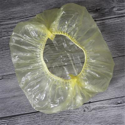 China Sustainable PE Hair Cover Head Cover Plastic Shower Bath Cap Hotel Cleaning Disposable Shower Caps for sale