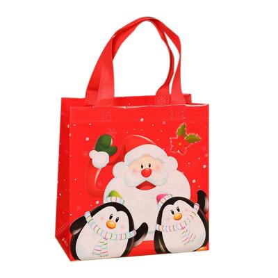 China Convenient Recycle Tote Bags Eco Friendly Products Laminated Non Woven Wholesale Christmas Gift Bag for sale