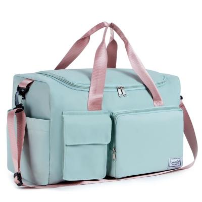 China Solid Color Sports Gym Bag With Shoes Compartment Weekend Travel Bag For Women Water Resistant Foldable Tote Hospital Bag for sale