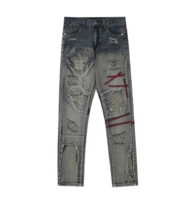 China Breathable 2022 High Street American Hip Hop Ripped Patch Jeans Washed Slim Pants Custom Printing Jeans for sale