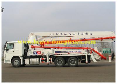 China SINOTRUK HOWO 37m concrete pump truck with 125 M3 / h 1370mm feeding height for sale