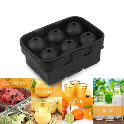 China Viable Custom Wholesale Price Whiskey Round Ice Cube Ball Maker Tray Molds Jumbo 4 Cavity Silicone Sphere Ice Ball Mold With Lid for sale