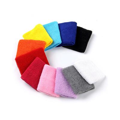 China Custom Universal Sports Embroidered Sweatbands Cotton To Reuse Rainbow Terry Sweat Wrist Band Embroidery Headband for sale