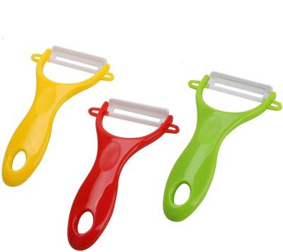 China Creative Sustainable Kitchen Accessories Fruit Vegetable Manual Potato Ceramic Peeler With Plastic Handle for sale