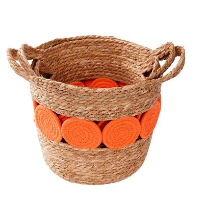 China Sustainable Woven Easter Straw Basket Plastic Laundry Basket Straw Basket for sale