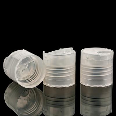 China 20/410 20mm Flip Top Plastic Bottle Caps Clear For Shampoo Body Lotion Cleanser for sale