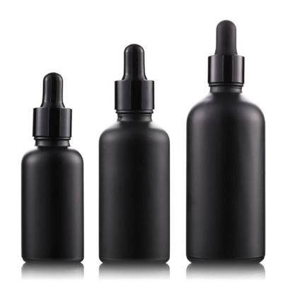 China Empty Essential Oil Bottles Glass Dropper Bottle  Black Aluminium Dropper for sale