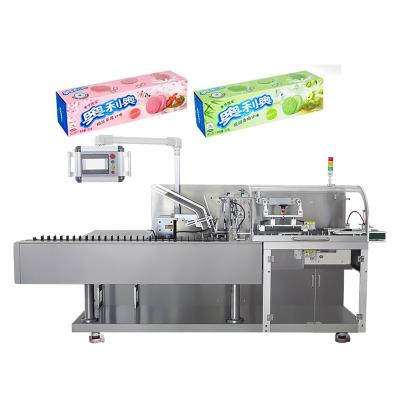 China Food Paper Cake Maker Video Cake Maker Manual Strapping Bottle Cosmetic Box Packing Machine for sale