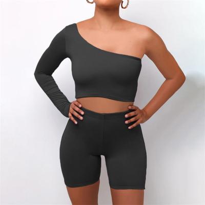 China 2021 QUICK DRY Women Spring Sexy Personality Off Shoulder Suit One Shoulder Tops Solid Two Piece Bikers Short Set for sale