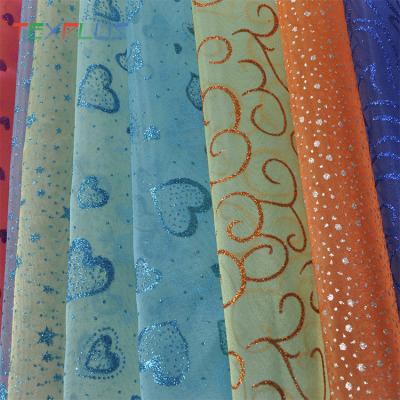 China Other cheap flower foil organza fabric is used by handbag for sale