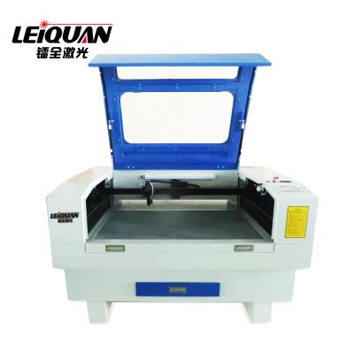 China 1490 Laser CUT CO2 Laser Engraving And Cutting Machine For Nonmetal 1400 x 900mm for sale