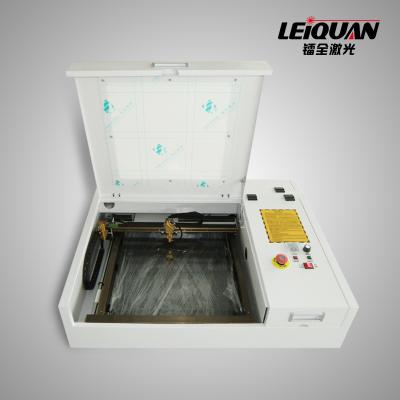 China Laser Engraving Mini Type 4030 CO2 40W Desktop Laser Engraving Machine For Craft Gift Industry for sale