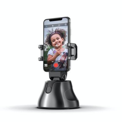 China Adjustable Mobile Phone Holder 360 Degree Rotation Smart Phone Stand Automatic Selfie Face Tracking Cell Phone Holders for sale