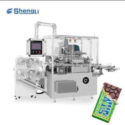 China Máquina de embalaje de envoltura plegable de barras de chocolate de alta velocidad personalizada con suministro de aire de 0.6Mpa en venta