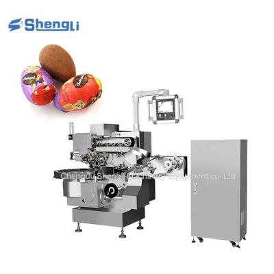 China Máquina para envolver huevos huecos/bolas de chocolate con larga vida útil a 220 V de voltaje en venta