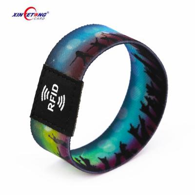 China Amusement Park Stretch RFID Wristband HF Woven Elastic 13.56Mhz RFID Chip Woven Elastic Wristband for sale