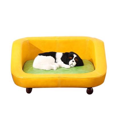 China Customized Manufacture Sustainable Sale Non Slip Dog Beds PU Leather Luxury Dog Sofa Bed for sale