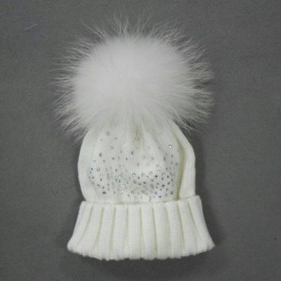 China COMMON winter hot sale fashion simple pure color thick brimming knitted cap pompom hat for women for sale