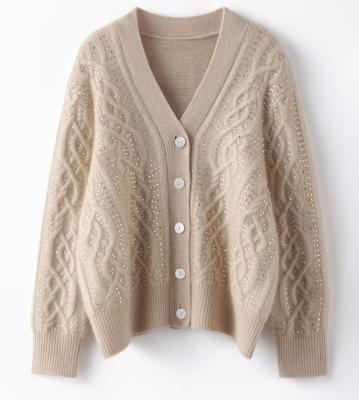 China Fashionable winter anti-pilling knitted sweater cable cardigan ironed ablazely adornmnet women sweaters for sale