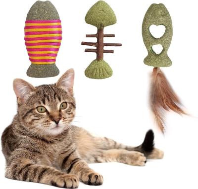 China 2023 Viable Wholesale 3 In 1 Self Adhesive Edible Pet Cat Catnip Toys Wall Fish Form With Feather Cat Toys for sale