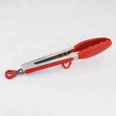 China Sustainable Food Grade Kitchen Serving Silicone Tongs With Stand Holder for sale