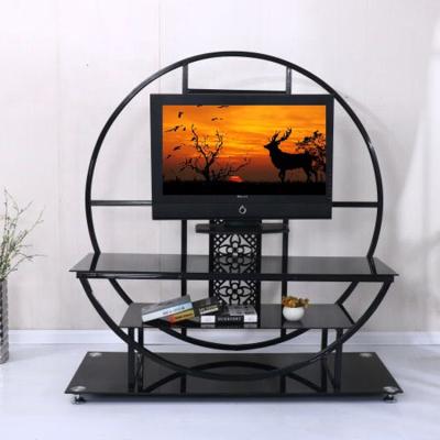 China Fine Workmanship Modern Designs Living Room Furniture Round Shape Black Metal Led TV Wall Unit for sale