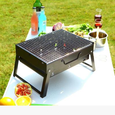 China Durable Table Top Folding Adjustable Outdoor Portable Smoker Grill BBQ Charcoal Size Mini Barbeque Grill for sale