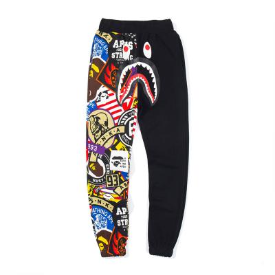 China Youth QUICK DRY personality graffiti print breeches Bape fashion slim casual men's pants for sale