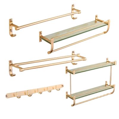 China Bolt Inserting Type Modern Luxury Nordic Wall Mounted Bathroom Shelf Gold Storage Rack Furniture Glass Metal Floating Bathroom Shelves For Wall for sale