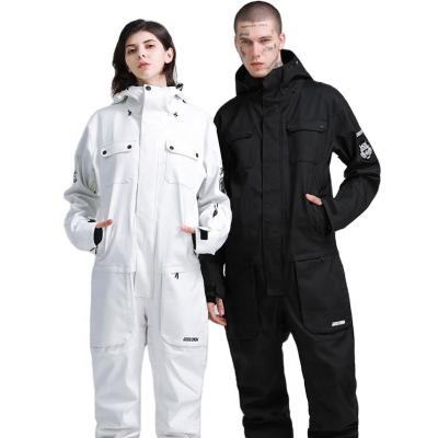 China Waterproof Men Windproof Adults Ski Outdoor Jumpsuit Women SNOW Couples Ski Suit Winter Warm Ski Breathable Siamese Suit Double Panel for sale