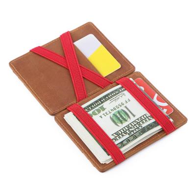 China RFID Vintage Leather Magic Pouch With Red Elastic Band OEM Magic Smart Card Holder Wallet for sale