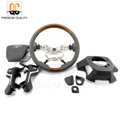 China Market Black Wood Hot Sale Oman Gray Leather Car Steering Wheel Whole Set For Land Cruiser LC79 Pick Up SUV FJ200 LC200 for sale