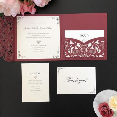 China Europe Floral Glitter Laser Cut Wedding Invitation Cards With Inner Envelope White Foil Ribbon for sale