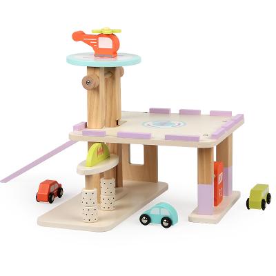 China Newest Non-Toxic Eco-friendly Pretend Play Toys With Wooden Lift Helicopter Landing Pad Simulation Parking Garage Toy for sale