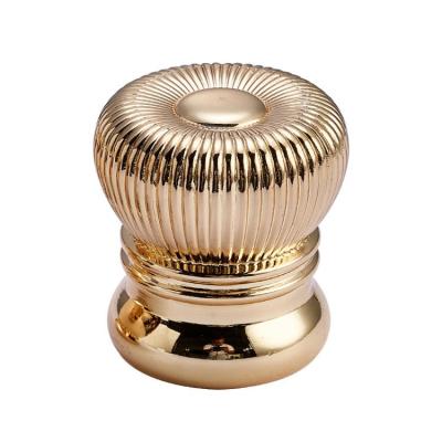 China OEM Art Stripe Simple Cylindrical Zamac Perfume Bottle Gold Cap For Glass Bottle for sale