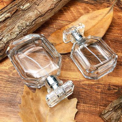 China Luxury Empty Glass Perfume Spray Bottles 50ml And 100ml With Cap for sale