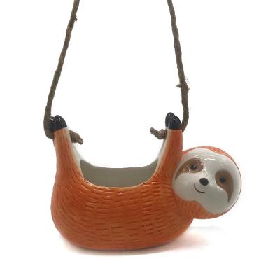 China Modern Creative Ceramic Sloth Hanging Pot for sale