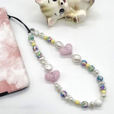 China Hot Selling Handmade Sc Pearl Mobile Phone Chain Polymer Clay Beads Phone Straps Fashion Pearl Heart Beaded Cell Phone Straps for sale