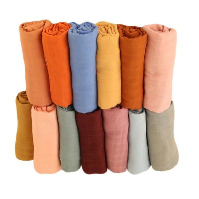 China Amazon Style Warm Muslin Gauze Flame Retardant Dyed Wrap Fiber 2 Layers Bath Towel Bamboo Newborn Blanket Wraps for sale