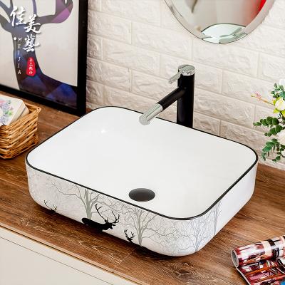 China Eco - Friendly Elk Forest Patterns Nordic Toilet Bathroom Sink On Counter for sale