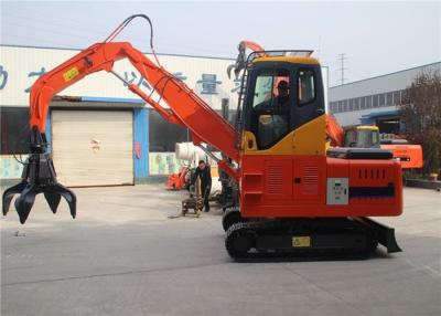 China El registro giratorio hidráulico del excavador de la correa eslabonada ataca de madera y de piedra ataque en venta