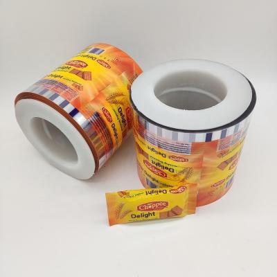 China Custom Moisture Proof Packaging Plastic Film Roll Laminating Printed Wrapping Film For Cookie Food Wrapping Wrapping Film Roll for sale