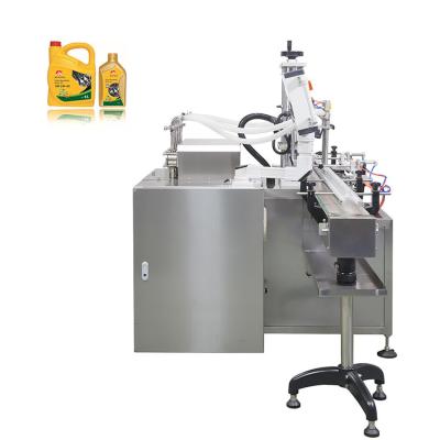 China GARMENT 4 Nozzle Automatic 2nd Generation Filling Machine for Spirits Edible Oil Ketchup Filling Machine for sale