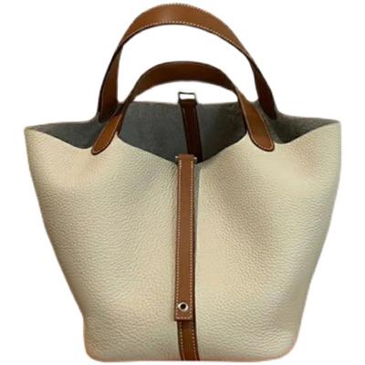 China 2021 Fashion New Customizable Color Matching Vegetable Basket Bag Bucket Bag Female Spring And Summer Wild Leather Cowhide Bag for sale