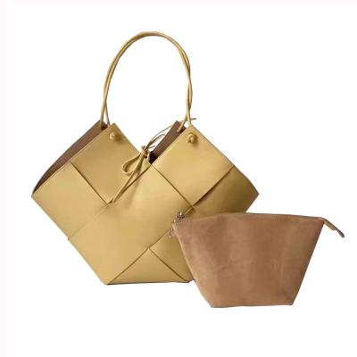 China Flower Female Western French High-end Large Capacity Lazy Basket Fashion Soft Cowhide Woven Armpit Bag Style Single Shoulder Handbag for sale