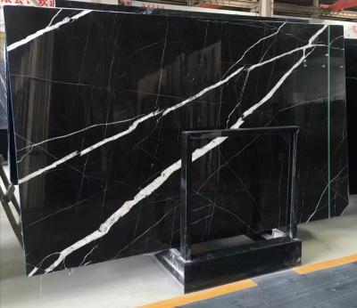 China Modern Dynamic Chinese Natural Polished Black Marquina Nero Marble Slab for sale