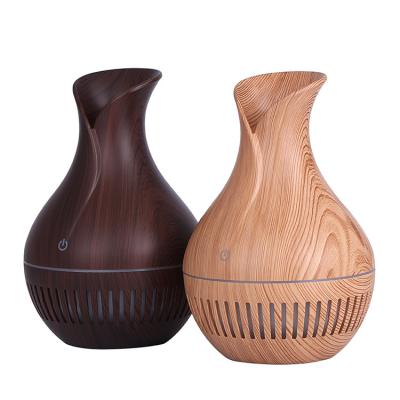 China Colorful LED Lights USB Mini Electric Humidifier Essential Wooden Diffuser for sale