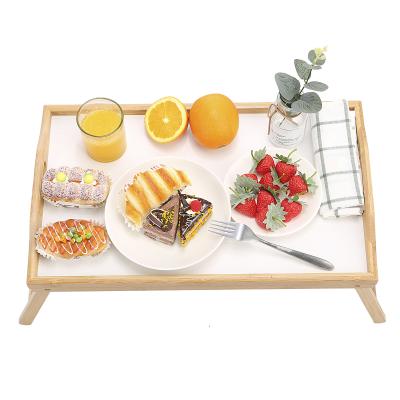 China Sustainable High Quality Natural Color Laptops Tablets Bamboo Snack Bed Serving Tray With Folding Legs for sale