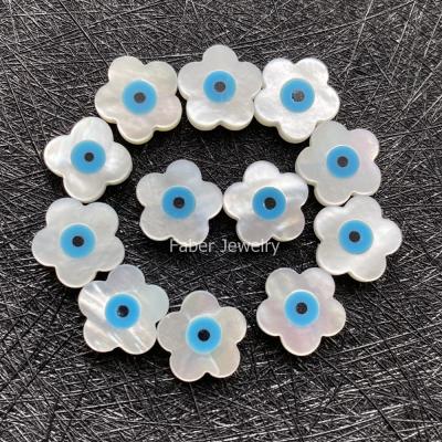 China Charming Color Game Or Fire Pearlescent Stone Natural Loose Flower Form 10x10mm Luxury Evil Eye Stones for sale