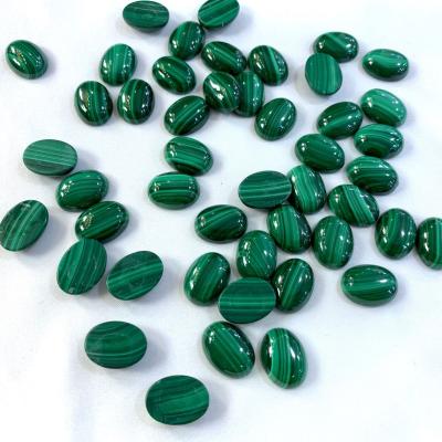 China Game Or Fire Color Loose Gemstone 4x6mm/5x7mm/6x8mm/8x10mm Natural Malachite Oval Cabochon For Jewelry Making for sale